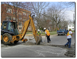 Murray Street Department employees performing repairs on a street