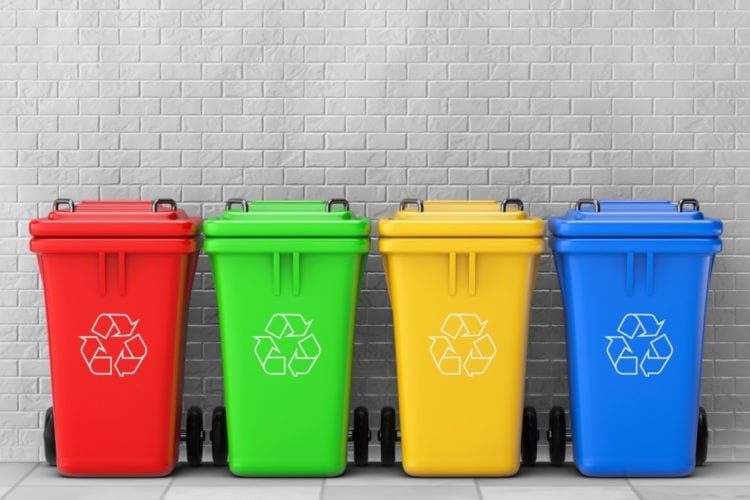 red, green, yellow, and blue recycling bins